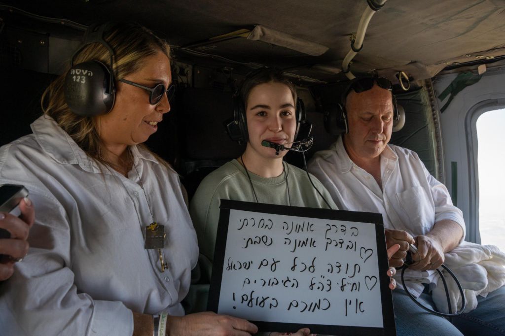 Former Israeli hostage Agam Berger with her parents, Meirav and Shlomi, aboard an Israeli Air Force helicopter en route to a hospital following her release after 482 days in Hamas captivity, Jan. 30, 2025. Credit: IDF Spokesperson’s Unit.