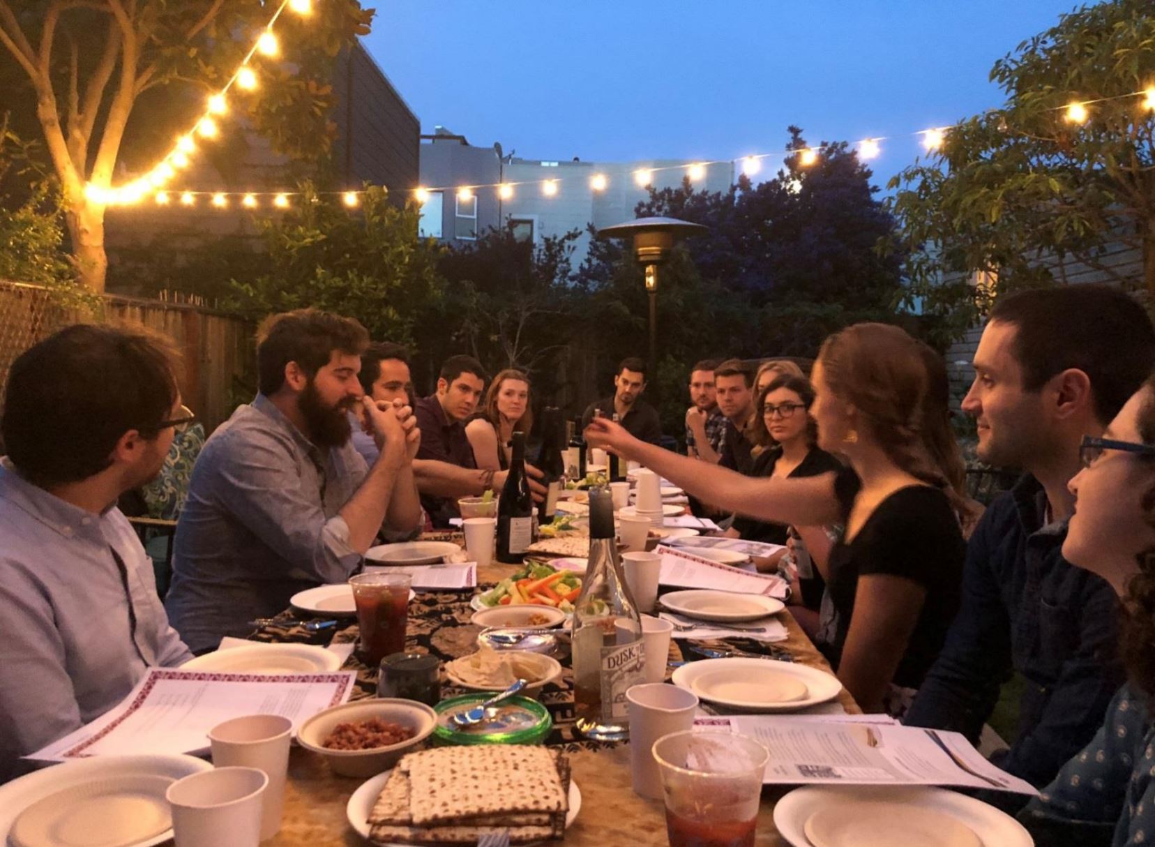Young adults at a Moishe House seder