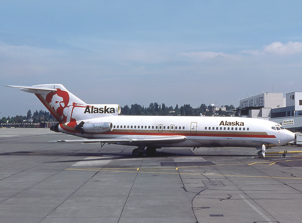 An Alaska Airlines Boeing 727-100 at Seattle–Tacoma International Airport in the mid 70s livery, Aug. 11, 1976. Photo by Michel Gilliand via Wikimedia Commons.