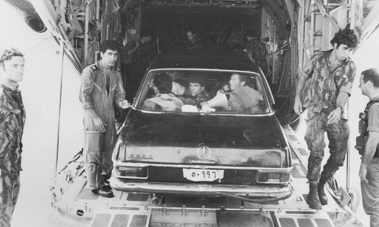Sayeret Matkal commandos pose with the black Mercedes they used to deceive Ugandan troops during the hostage rescue at Entebbe Airport on July 4, 1976. Credit: IDF Spokesperson.
