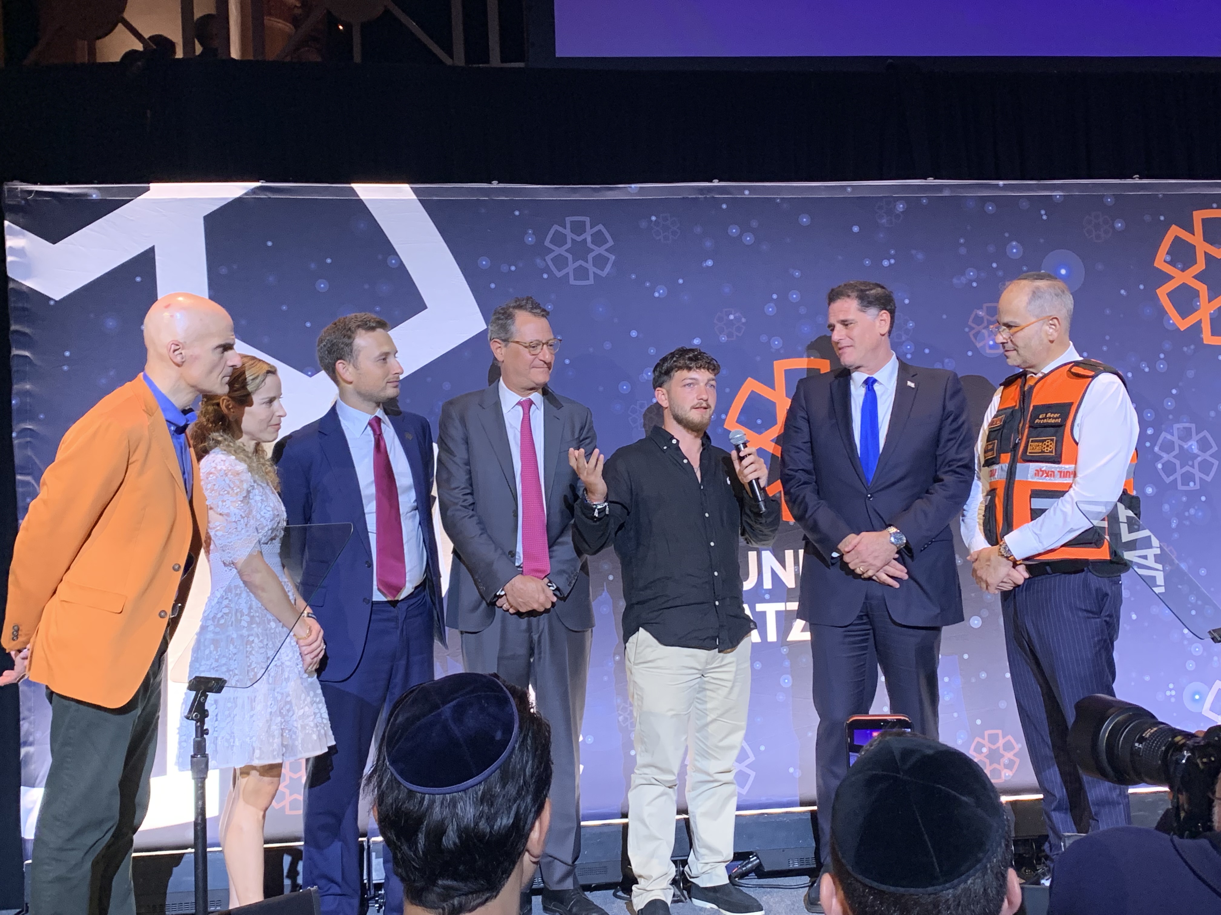 (From left) United Hatzalah board chairman Mark Gerson, board members Rabbi Erica Gerson and Alex Witkoff, David Blitzer, Bar Kupershtein, Ron Dermer and United Hatzalah founder and president Eli Beer at the United Hatzalah NY Gala, June 15, 2026. Credit: United Hatzalah.