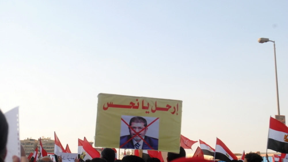 A protest against former Islamist President Mohamed Morsi in Egypt, June 28, 2013. Photo: Lilian Wagdy via Wikimedia Commons.