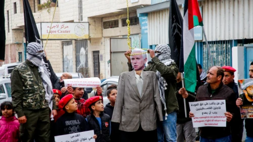 Palestinians hang dolls bearing the portrait of U.S. Vice President Mike Pence and U.S. President Donald Trump during a protest in the West Bank city of Bethlehem on Jan. 27, 2018. Photo by Wisam Hashlamoun/Flash90.