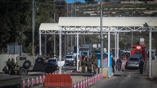 Israeli soldiers and security forces at the scene of shooting attack at a checkpoint near the Jewish settlement of Beit El on Jan. 31, 2016. Photo by Flash90.