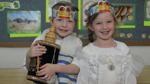 Israeli children celebrate the Shavuot holiday in a kindergarten in Efrat, May 13, 2013. Photo by Gershon Ellinson/Flash90.