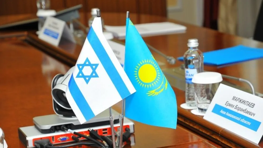 Israeli and Kazakh flags together. Relations between the two nations—one Jewish and one Muslim—have continued to grow under the new President of Kazakhistan Kassym-Jomart Tokayev. Credit: Israeli Embassy in Kazakhstan via Twitter.