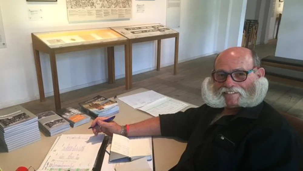 Haim Hoffmann, a German champion for the “Imperial Beard,” at the Otto Weidt Workshop for the Blind Museum in Berlin. Credit: Orit Arfa.