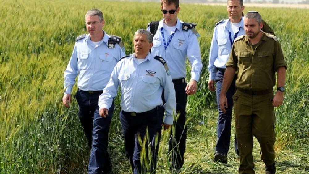 Click photo to download. Caption: Israel Air Force Commander Major General Amir Eshel (front) investigating the accident in which two Air Force pilots were killed in an Israeli military helicopter crash in the Revadim area south of Gedera on Tuesday, March 12. Credit: Yossi Zeliger/Flash90