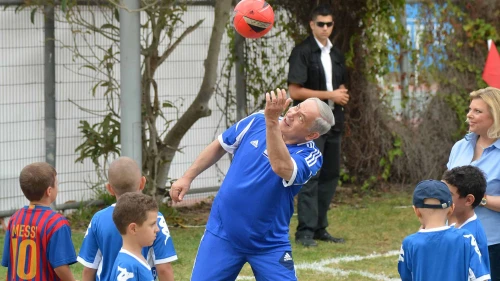 Israeli Prime Minister Benjamin Netanyahu plays soccer with young children sick with cancer and F.C. Barcelona players in Jaffa's Bloomfield Stadium, near Tel Aviv, Aug. 4, 2013. Photo by Yossi Zeliger/Flash90.