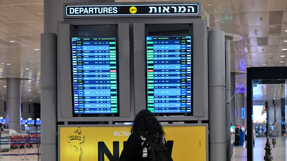 A traveler at Ben-Gurion International Airport near Tel Aviv, Jan. 4, 2022. Photo by Arie Leib Abrams/Flash90.