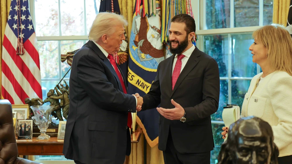 U.S. President Donald Trump welcomes Syrian President Ahmed al-Sharaa to the White House in Washington on Nov. 10, 2025. Source: @SyPresidency/X.