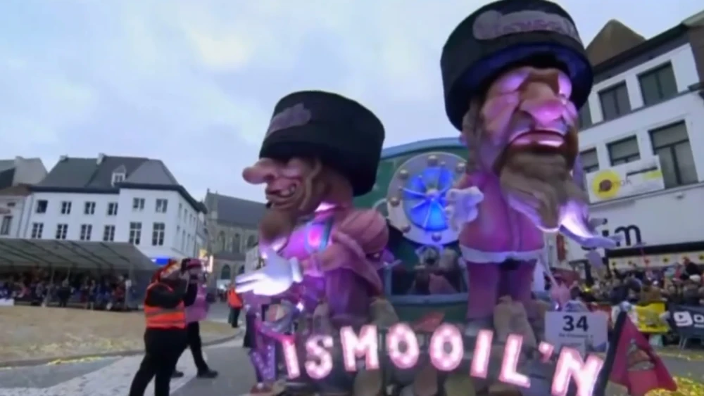 A view of a parade float at the Carnival of Aalst in March 2019, featuring two Orthodox Jewish caricatures that were widely condemned as anti-Semitic. Source: Screenshot.
