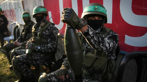 Hamas members take part in a rally marking the Palestinian terror group’s 29th anniversary in Gaza on Dec.16, 2016. Credit: Abed Rahim Khatib/Flash90.