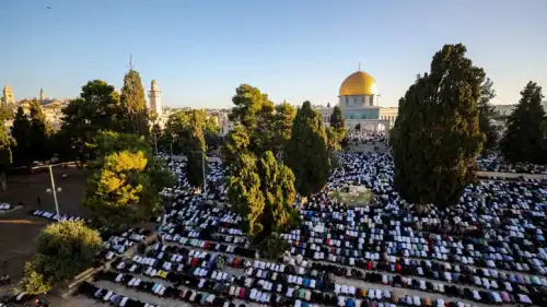 Muslims pray near the Al-Aqsa mosque on the Temple Mount during the Eid al-Adha holiday, June 28, 2023. Photo by Jamal Awad/Flash90.