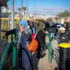 Palestinian workers line up at the entrance to the Israeli city of Ma'ale Adumim in Judea following an attempted stabbing attack, Feb. 23, 2023. Photo by Jamal Awad/Flash90.