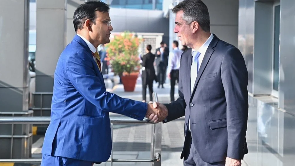 Israel's Foreign Minister Eli Cohen, right, is greeted by Official Spokesperson for the Indian Ministry of External Affairs Arindam Bagchi upon his arrival to New Delhi on May 9, 2023. Source: Twitter.