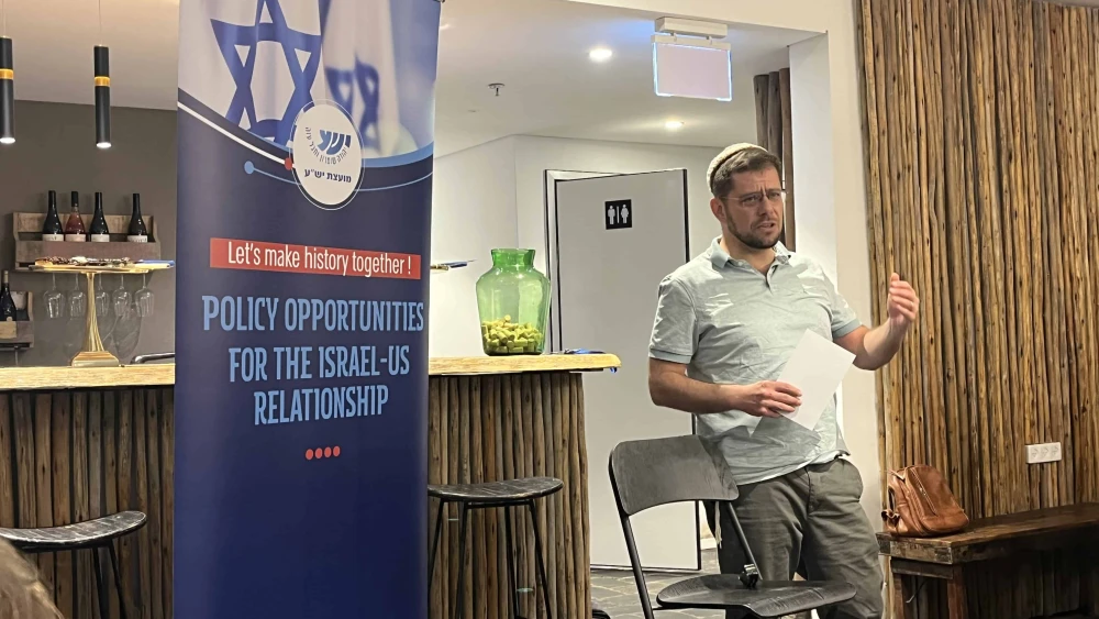 Professor Eugene Kontorovich addresses the "Policy Opportunities for the Israel-U.S. Relationship" conference in Binyamin, Dec. 4, 2024. Photo by Josh Hasten.