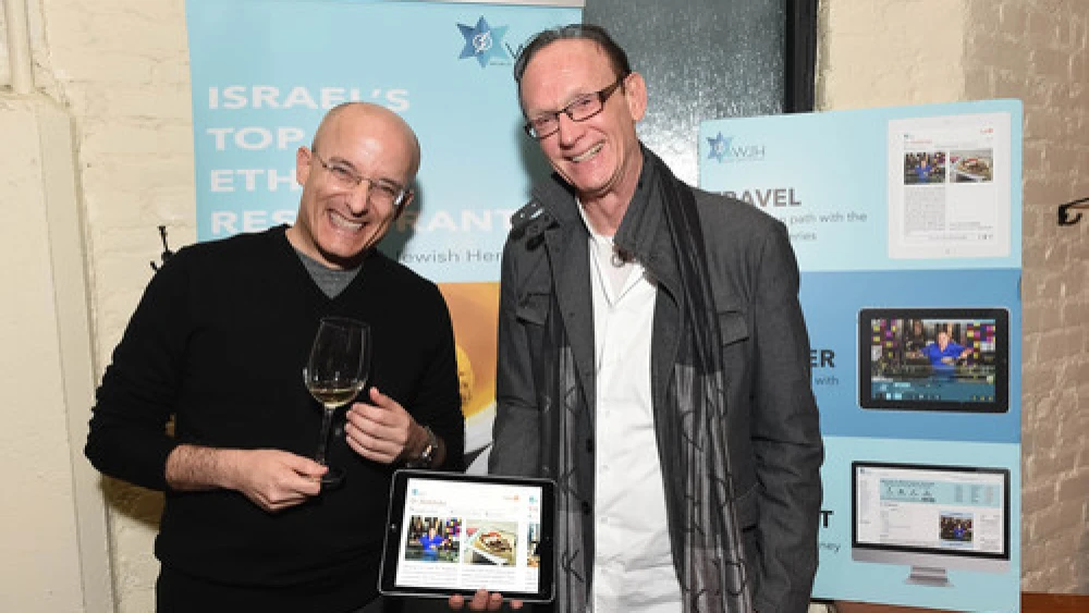 Israeli food critic Gil Hovav (left) and World Jewish Heritage Organization (WJH) founder Jack Gottlieb during the Jan. 14 launch of WJH's eBook, “Israel’s Top 100 Ethnic Restaurants,” at New York City's Balaboosta restaurant. Credit: Shahar Azran.