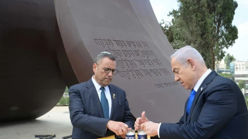 Prime Minister Benjamin Netanyahu and Jerusalem Mayor Moshe Lion light memorial candles at the Oct. 7 monument in the capital, Oct. 7, 2024. Photo by Amos Ben Gershom/GPO.