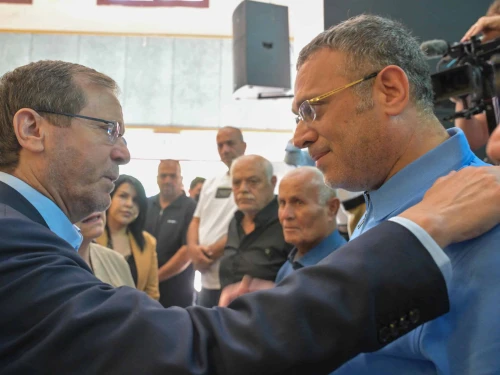 Israeli President Isaac Herzog visits the northern town of Tamra, where four young women were killed by an Iranian missile strike, June 18, 2025. Photo by Kobi Gideon/GPO.