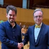 Bart de Wever, right, shakes hands with Lahav Shani in Essen, Germany on Sept. 13, 2025. Photo courtesy of Bart De Wever.