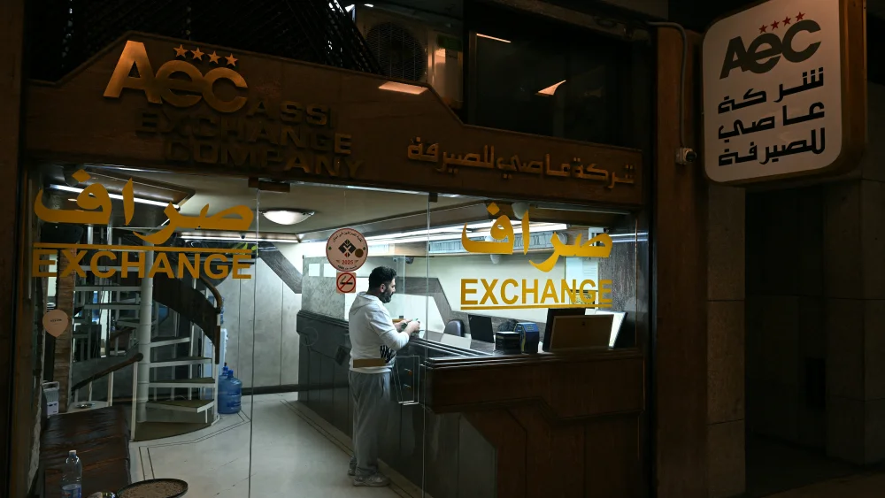A client stands at a money exchange office in Beirut on Nov. 14, 2025. Lebanon announced on Nov. 14 that money changers and transfer companies must comply with stricter requirements as the country faces heavy U.S. pressure to regulate its cash economy and halt financing to the terrorist group Hezbollah. Photo by Joseph Eid/AFP via Getty Images.