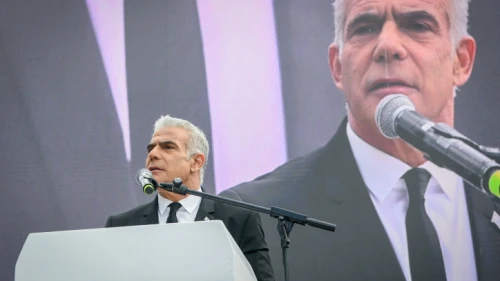 Opposition leader Yair Lapid speaks at a protest outside the Knesset in Jerusalem against the government's judicial reform plan, Feb. 13, 2023. Photo by Arie Leib Abrams/Flash90.
