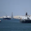 Ships sail along Egypt's Suez Canal near Ismailia on April 16, 2025. Photo by Khaled Desouki/AFP via Getty Images.