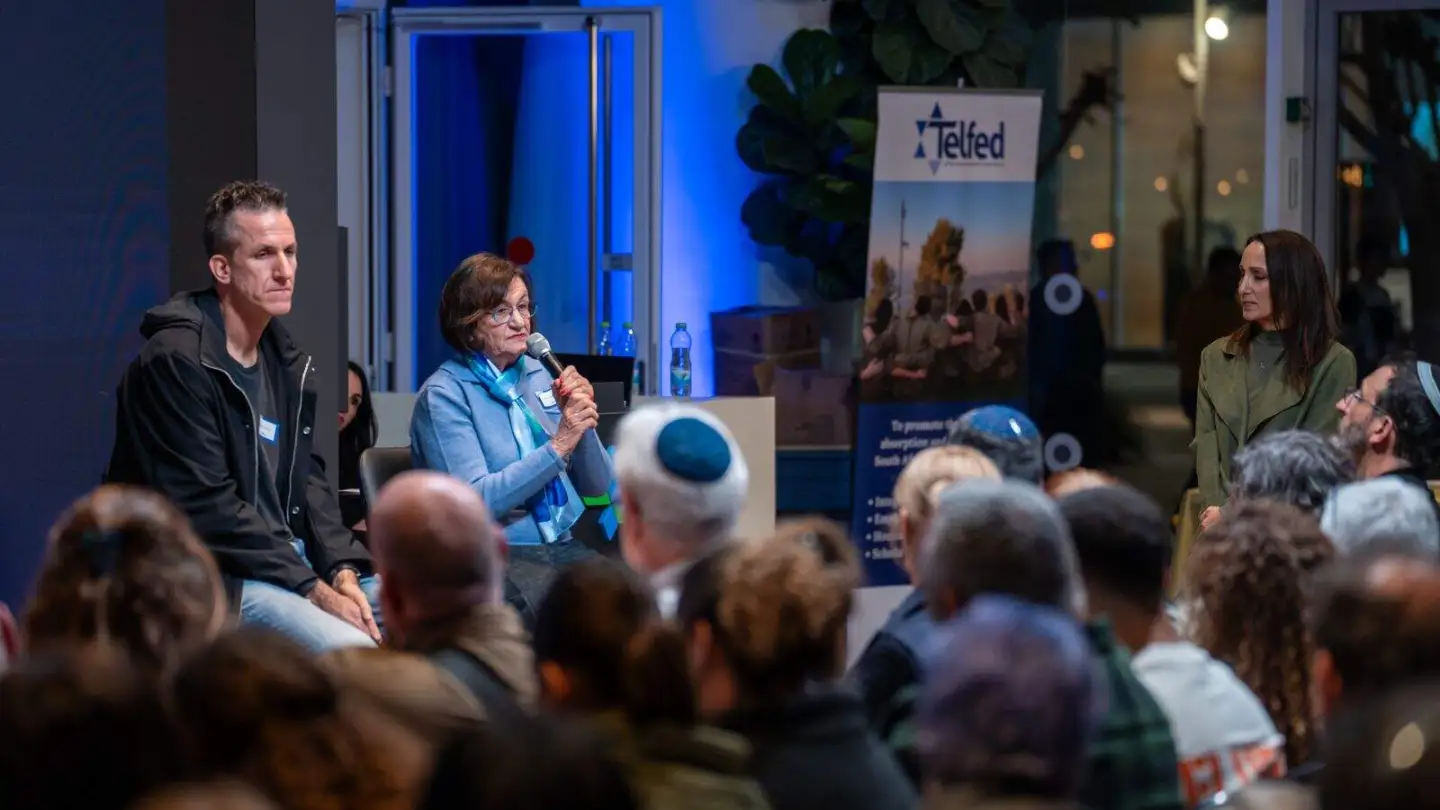 Dudu Baron and Carol Goldfus talk to Benita Levin about caring for wounded IDF soldiers at the Telfed event in Herzliya, Dec. 30, 2025. Photo by Brian Spector.