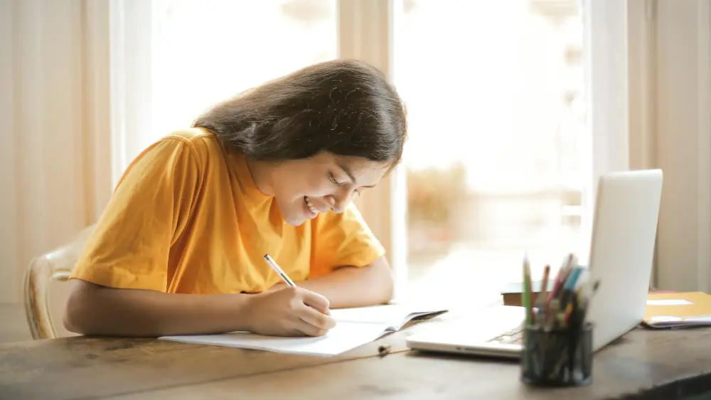 Young woman, Student, Writing