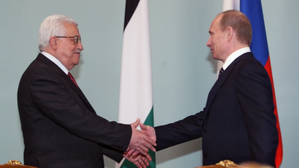 Russian President Vladimir Putin meets with Palestinian leader Mahmoud Abbas in Moscow, on April 7, 2009. Photo by Dmitry Azarov/Flash90.