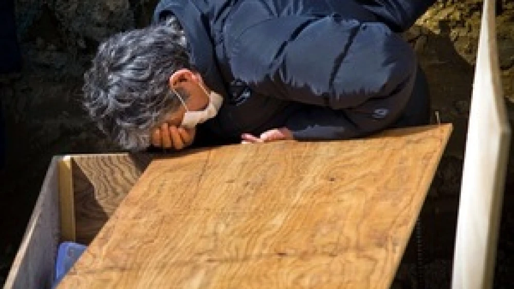 A man is grief-stricken after the earthquake and tsunamis devastate Japan in March. Rabbi Kushner guides the way to facing God after suffering tragedy and the loss of loved ones. Credit: Douglas Sprott.