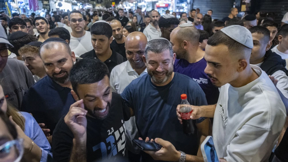 Amcha Yisrael party chairman Ofer Winter and party member Yoseph Haddad tour the Mahane Yehuda Market in Jerusalem ahead of the upcoming general elections, September 17, 2026. Photo by Chaim Goldberg/Flash90