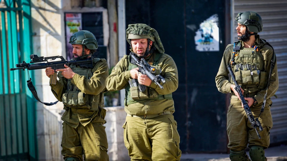 Israeli soldiers seen during a military raid, in the Samaria city of Jenin, Dec. 12, 2023. Photo by Nasser Ishtayeh/Flash90.