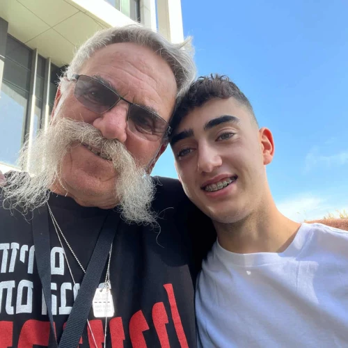 Josef Avi Yair Engel and his grandson, former captive Ofir Engel, who was released as part of a weeklong ceasefire agreement between Israel and Hamas in late 2023. Credit: Courtesy.