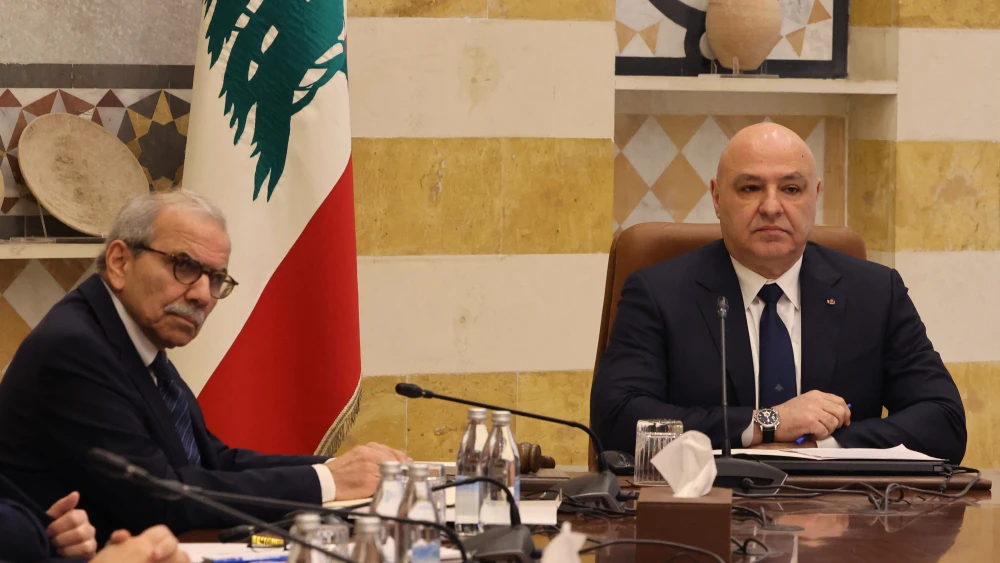 President Joseph Aoun (R) chairs the first meeting of Lebanon's new government, along with Premier Nawaf Salam, at the Baabda presidential palace, east of Beirut, on Feb. 11, 2025. Photo by Anwar Amro/AFP via Getty Images.