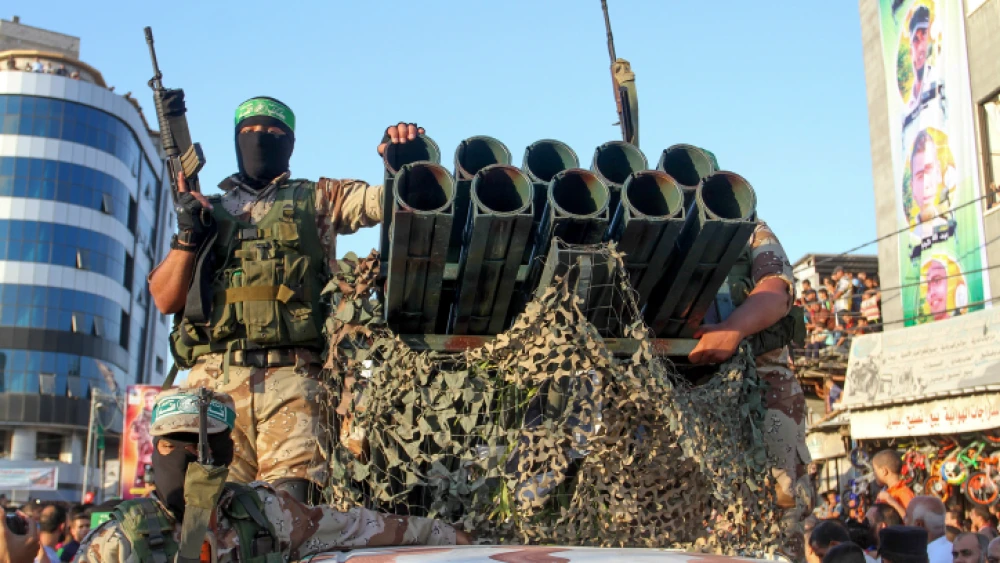 Al-Qassam Brigades members take part in a military parade on Aug. 21, 2016 in the Gaza Strip. Photo by Abed Rahim Khatib/Flash90.