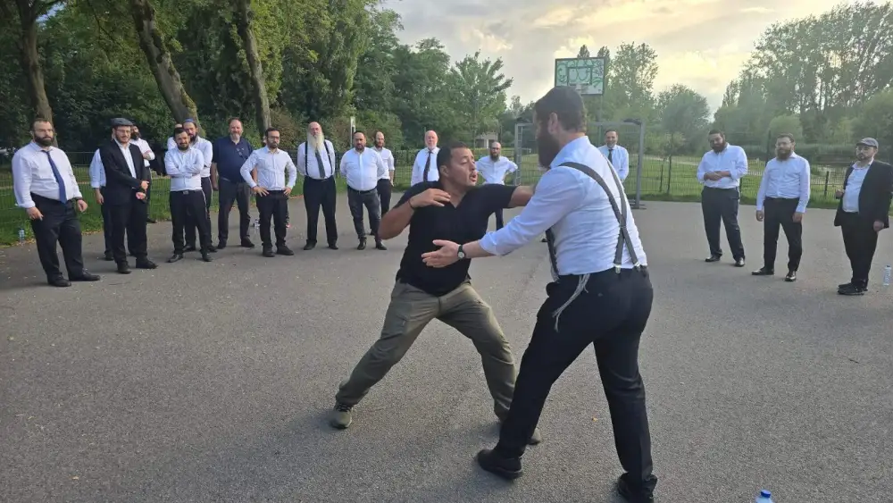 A guide trains rabbis in krav maga in Eindhoven, the Netherlands on July 22, 2025. Photo credit: RCE.