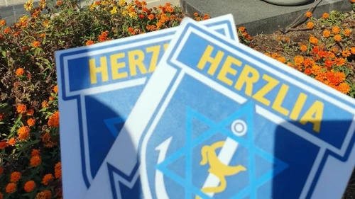 Posters bearing the logo of South Africa's United Herzlia Schools. Credit: Courtesy.