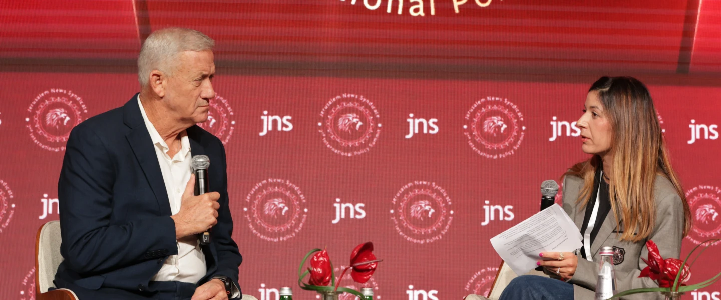 JNS news correspondent Amelie Botbol interviews former Israeli Defense Minister Benny Gantz at the second annual JNS International Policy Summit at the Waldorf Astoria in Jerusalem, June 23, 2026. Credit: JNS.