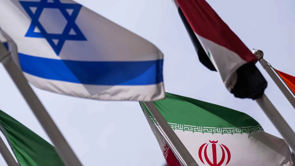 The flags of Iran and Israel are seen during a Board of Governors meeting of the International Atomic Energy Agency at IAEA headquarters in Vienna, on June 23, 2025. Photo by Christian Bruna/Getty Images.