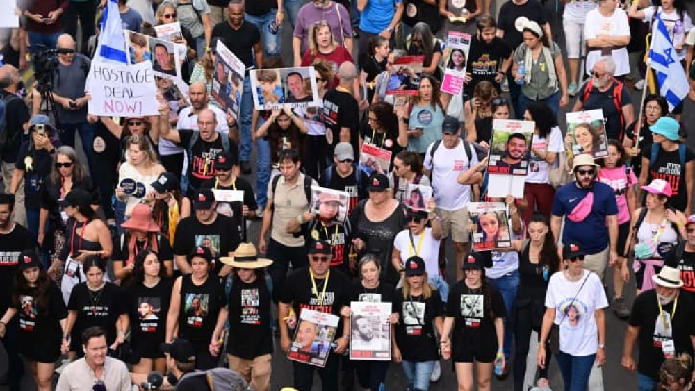 Israelis march in Tel Aviv towards the Israeli parliament in Jerusalem, as part of a protest for the release of Israelis held kidnapped by Hamas terrorists in Gaza on Nov. 14, 2023. Photo by Tomer Neuberg/Flash90.