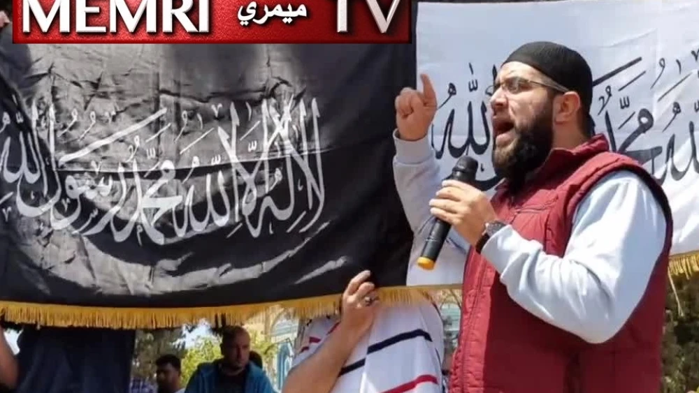 In this still image taken from a video posted on May 10, 2019, Palestinian cleric Nidhal Siam is seen addressing a crowd outside the Al-Aqsa mosque in Jerusalem. (MEMRI)