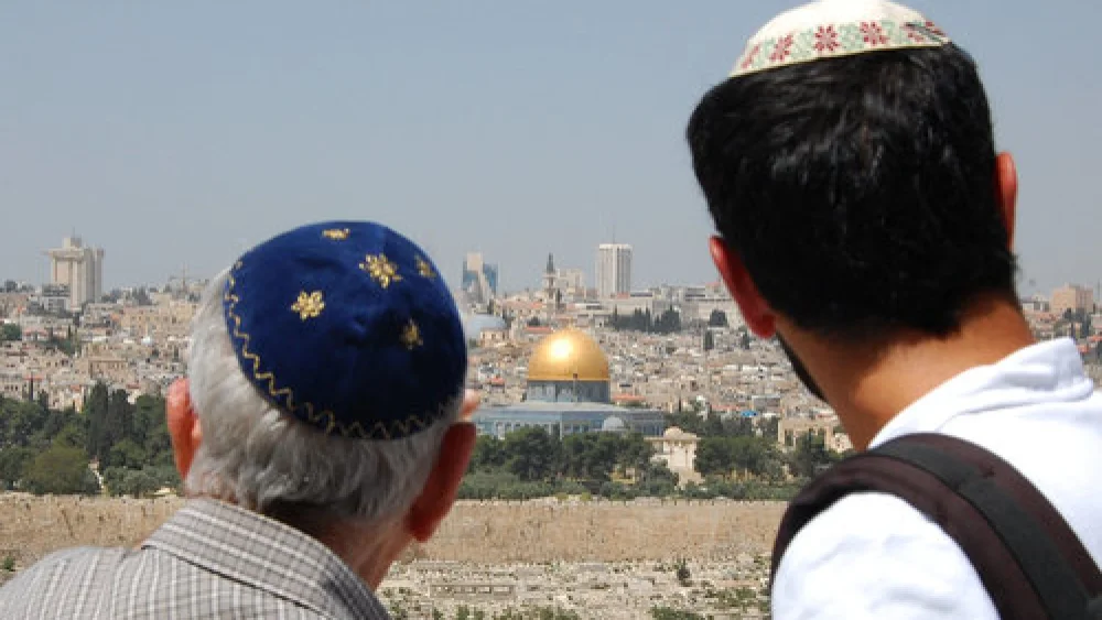 Two Jewish men look at Jerusalem’s Old City, including the Temple Mount, from the Mount of Olives. Credit: Rachael Cerrotti/Flash90.