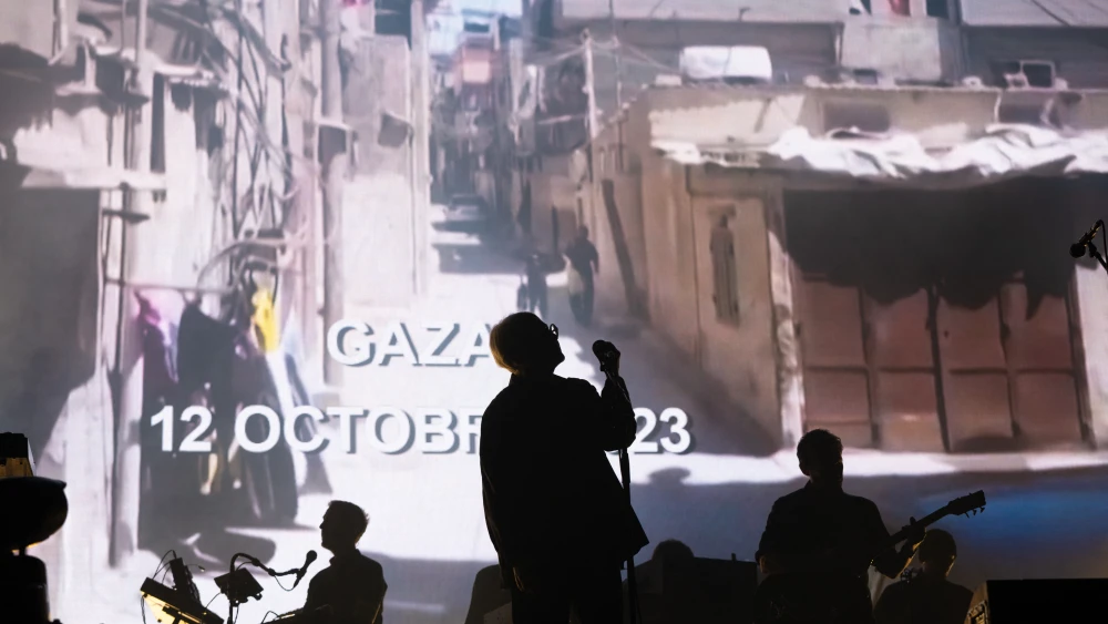 An image of Gaza is displayed in the background during a Massive Attack concert at the Rock en Seine festival in Saint-Cloud, France, Aug. 24, 2024. Photo by Sandrine Marty/Hans Lucas/AFP via Getty Images.