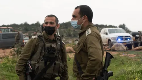 IDF Ephraim Regional Brigade commander Col. Yiftach Nurkin and Duchifat Battalion commander Lt. Col. Nir Ifergan asses the scene of a suspected terror attack at Sde Ephraim Farm in Judea and Samaria, Feb. 5, 2021. Credit: IDF.
