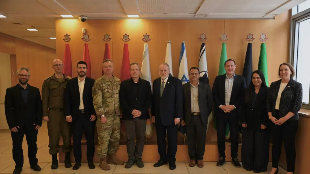 Officials from the Israeli Defense Ministry and the U.S. government pose for a group photo in Tel Aviv this week during the opening meeting of talks on a new bilateral defense partnership, the ministry said. Credit: Israel Ministry of Defense.