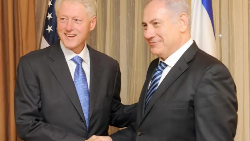 U.S. President Bill Clinton greets Israeli Prime Minister Benjamin Netanyahu in New York on Nov. 8, 2010. Photo by Avi Ohayon/GPO/Flash 90.