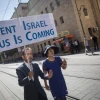 Christian missionaries march on Jaffa Road with a sign saying “Repent Israel, Jesus Is Coming” in central Jerusalem on Oct. 5, 2016. Photo by Hadas Parush/Flash90.