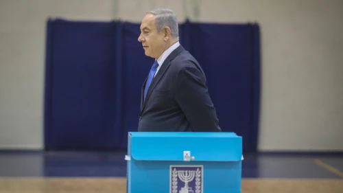 Israeli Prime Minister Benjamin Netanyahu casts his ballot at a voting station in Jerusalem on March 2, 2020. Photo by Marc Israel Sellem/POOL.